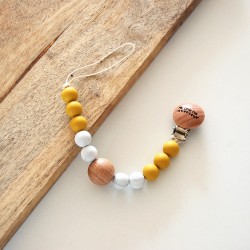 Attache tétine pour bébé coloris jaune curry